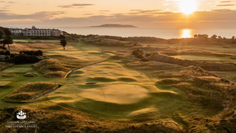Stunning coastal golf course at sunset, lush greens, and luxurious hotel, offering a serene and scenic getaway.