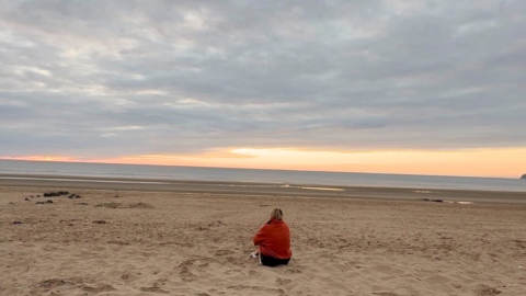 Experience serene beach views at sunset from the golden sands, perfect for relaxation and tranquillity.