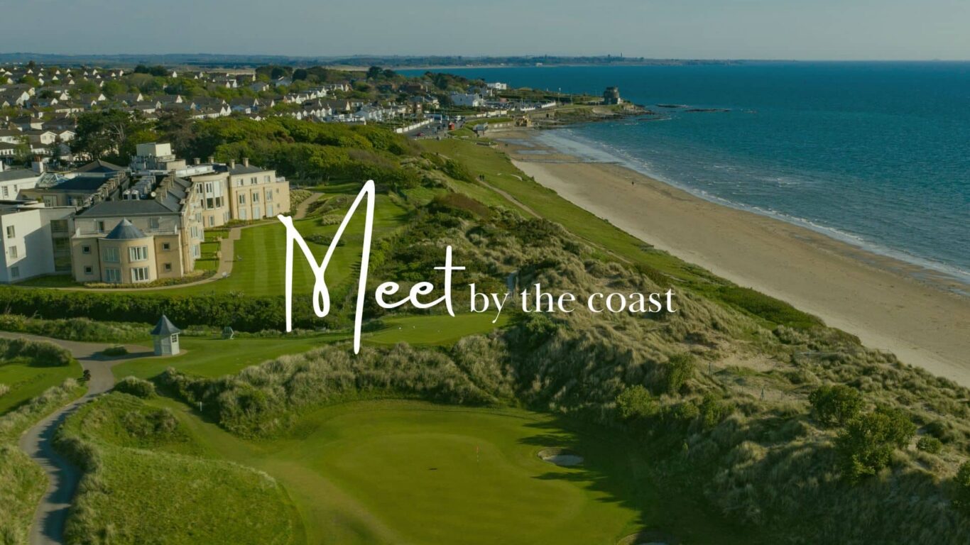 Luxurious coastal hotel with stunning sea and golf course views, ideal for relaxing seaside getaways and leisure activities.